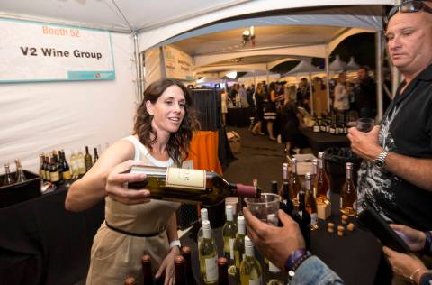 Guest sample wines are seen at the V2 Wine Group booth during the UNLVino fundraiser in Las Veg . 