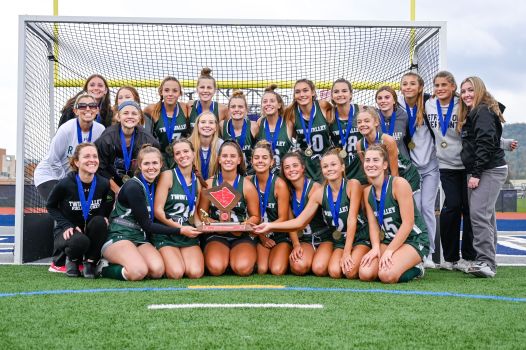 The Twin Valley field hockey team poses with the trophy after beating Oley Valley to win the Berks title. (COURTESY OF BILL SNOOK)